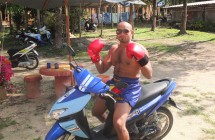 Roy on scooter while training at Rawai Muay Thai