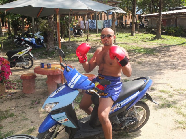 Roy on scooter while training at Rawai Muay Thai