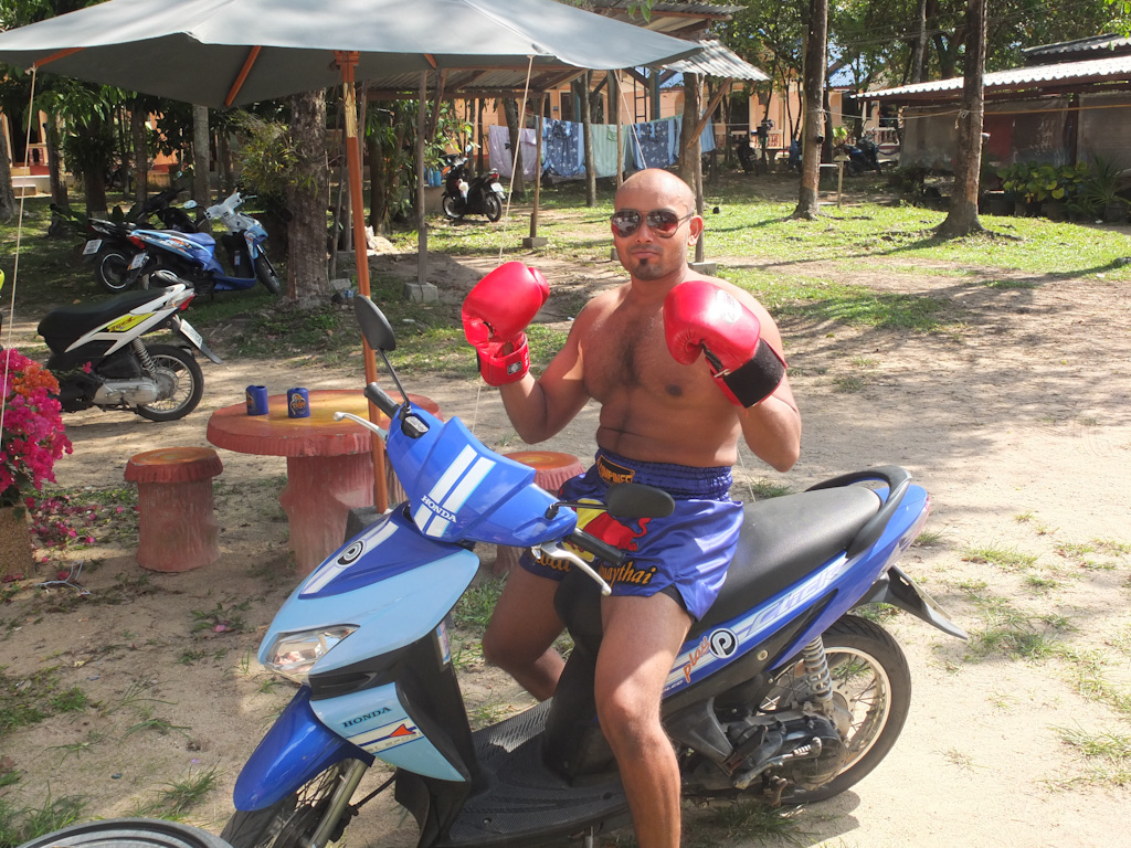 Roy on scooter while training at Rawai Muay Thai